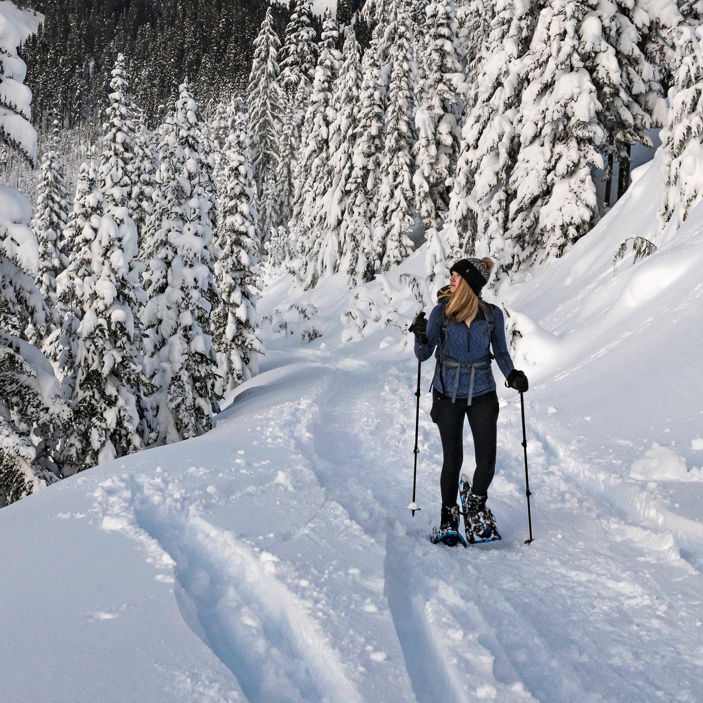 women using rental snowshoes when in Rangeley, Maine.