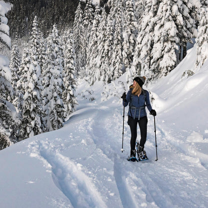 women using rental snowshoes when in Rangeley, Maine.